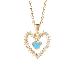 Elegant gold necklace with hollow heart pendant and blue enamel drop on white background