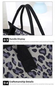 Detail of reinforced black woven handles and leopard print fabric on a shoulder bag
