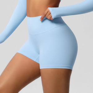 Detail shot of light blue high-waisted yoga shorts with butt-lifting effect
