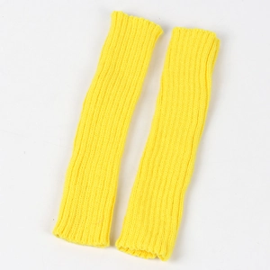 Detailed close-up of bright yellow ribbed knit arm warmers with elastic texture