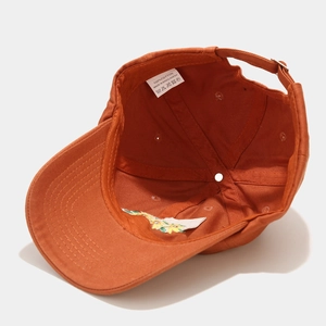 Terracotta baseball cap with flower embroidery made of 100 percent cotton fabric