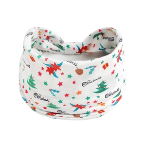 Detail of Christmas themed white headbands with holiday trees and poinsettia patterns