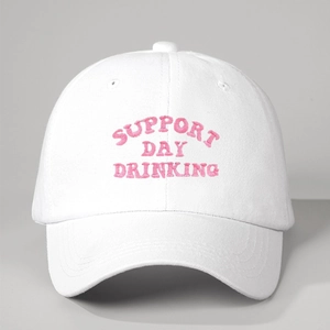 White cotton baseball cap featuring pink Support Day Drinking embroidery on front