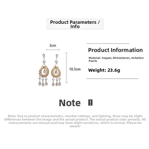 Detailed view of rhinestone pearl drop earrings with size 10.5x3cm and material specs