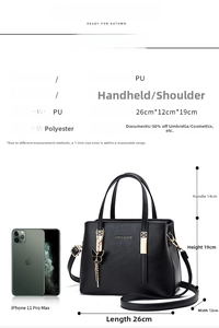 Detailed dimension chart showing 26x12x19cm black PU leather handbag with metal charm