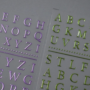 Self-adhesive 3D metallic letter nail art stickers with purple and green foil finish
