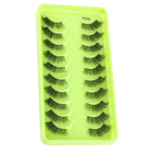 Detail view of 10 pairs of dense criss-cross false eyelashes in a green tray YK309