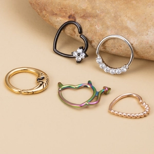 Five-piece nose ring set with heart and moon zircon studs in varied metallic finishes