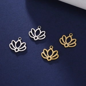 Detailed view of hollow lotus pendants in silver and gold plating for DIY jewelry making
