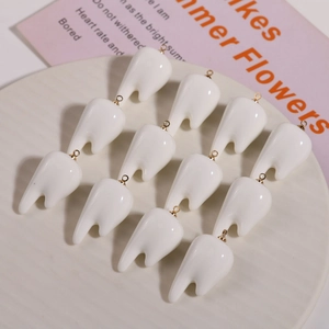 Set of 12 creative 3D resin tooth charms with gold metal loops for DIY jewelry making