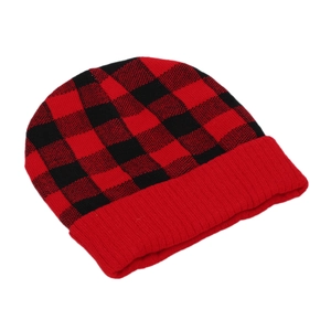Detailed close-up of red and black checkered knit beanie with a folded cuff design