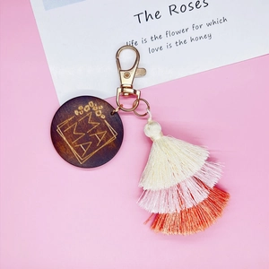 Handmade Bohemian MAMA keychain with colorful gradient tassels and wood charm pendant