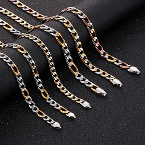 Polished NK link chain necklace in mixed gold, silver, and rose gold stainless steel