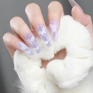 Long coffin press-on nails in translucent purple with 3D white butterflies and silver lines