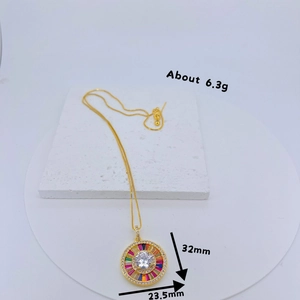 Retro gold necklace with colorful gemstone pendant and micro-paved diamond border