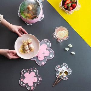 Japanese style cherry blossom heat resistant PVC table mats in pink and white floral shapes