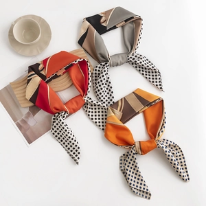 Silk leopard print square scarf set in red, grey, and orange with checkered edges