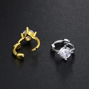 Classic round huggie earrings with cubic zirconia inlay in gold and silver finish
