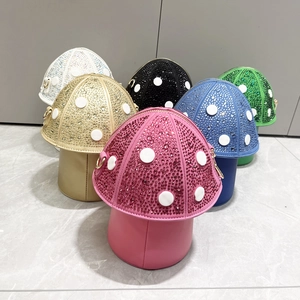 Sparkly mushroom-shaped rhinestone handbags in pink, blue, gold, black, white and green
