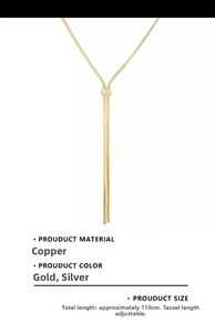 Detail view of adjustable 110cm gold snake chain necklace with elegant fringe tassel