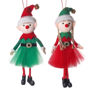 Christmas elf ornaments with red and green outfits, tulle skirts and tiny bells on white backdrop