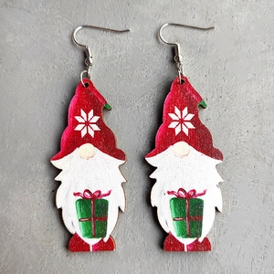 Close-up detail of Christmas gnome wood drop earrings with festive red and green colors