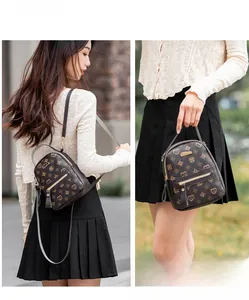 Mini floral monogram backpack shown in detail as both a shoulder and crossbody bag