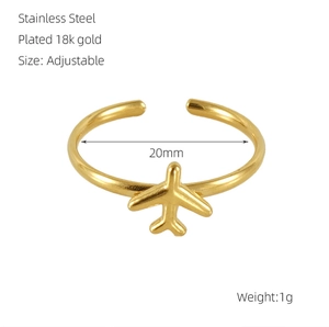 Detail view of 18k gold plated stainless steel airplane ring with adjustable band size