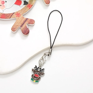 Detail of reindeer Christmas charm made of oil-dripping metal with silver lobster clasp