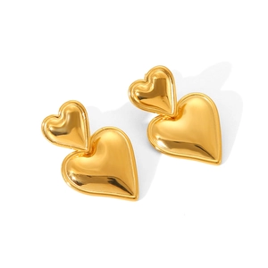 Polished 18k gold double heart stainless steel stud earrings for women on white background