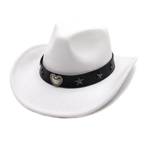 Close-up of white felt cowboy hat with black leather band and silver star studs