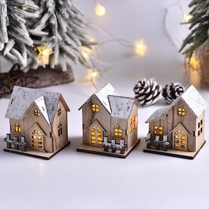 Three-piece set of wooden Christmas village houses with warm LED lights and snow-capped roofs