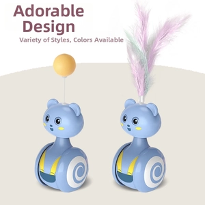 Blue bear-shaped cat tumbler toys with a yellow ball and colorful feather accessories
