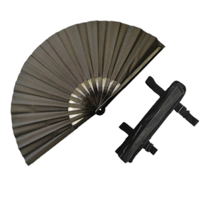 Detail view of a 33cm black Kung Fu folding fan with a matching cloth storage pouch