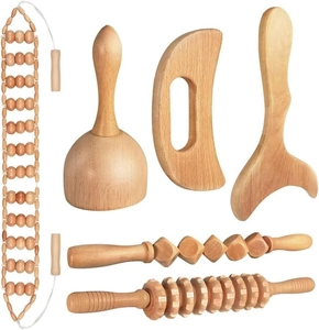 Detailed 6-piece wooden massage tool set including rollers, gua sha board and massage rope
