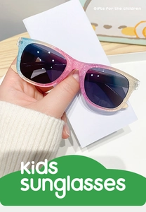 Macro detail of kids glitter square sunglasses with blue pink and yellow gradient frame