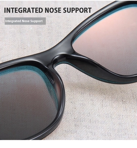 Detailed close-up of the integrated nose support on black bamboo wood sunglasses