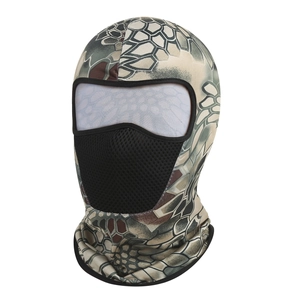 Detail of camouflage tactical face mask featuring breathable black mesh fabric on mouth area