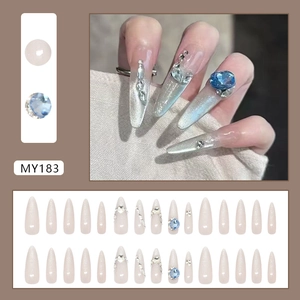 Uñas postizas ojo de gato con diamantes azules y piedra de luna forma almendra brillante
