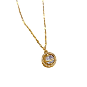 Titanium steel planet necklace with crystal pave setting on a minimal gold chain
