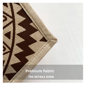 Macro detail of high-quality linen tote bag featuring dark brown geometric zigzag weaving