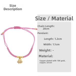 Detail of pink woven bracelet with golden octopus charm featuring sparkling zircons