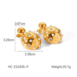 Detailed view of gold beetle earrings with pearls and crystals including dimensions