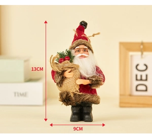 Detail view of plush Santa Claus figurine with 13cm height and 9cm width dimensions