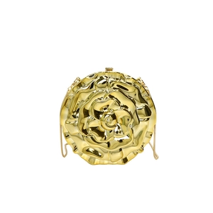 Golden rose-shaped evening clutch bag with metal chain strap on white background