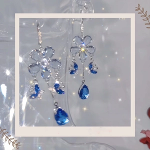 Elegant silver earrings with blue crystal butterflies and water drop tassels in dreamy style