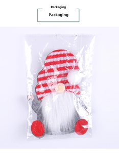 Christmas gnome cutlery holder in red striped hat and grey felt packaging details