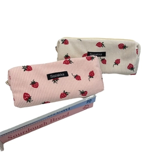 Corduroy pencil pouch with strawberry floral print and zipper closure in pink and cream