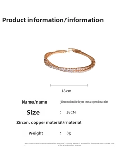 Macro detail of rose gold double-layer zircon cross open bracelet with fine pavé setting