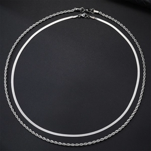 Silver stainless steel double layered necklace featuring snake and rope chain designs